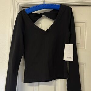 Black V-Neck Long Sleeve Athleta Shanti twist top
Size M